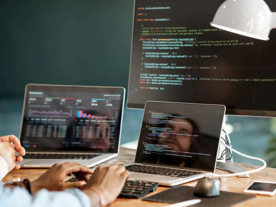 Screens with code and data charts